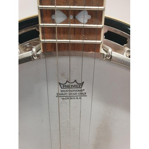 181 - A Richwood RBJ-705 banjo with stand, shipping unavailable