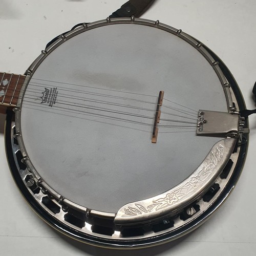 181 - A Richwood RBJ-705 banjo with stand, shipping unavailable