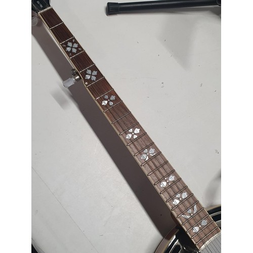 181 - A Richwood RBJ-705 banjo with stand, shipping unavailable