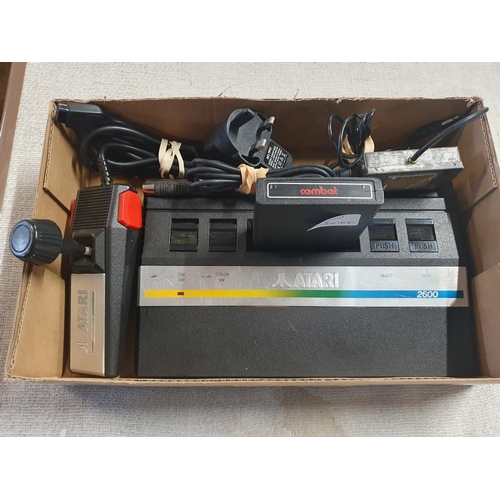 309 - A Atari 2600 games console with accessories in working order