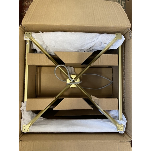 162 - A boxed Mark's and Spencer's ceiling light (unchecked), shipping unavailable