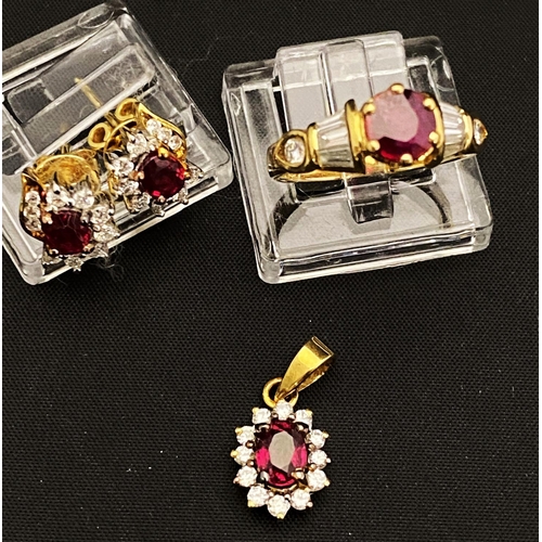 107 - A18ct gold Ruby and Diamond ring pendant and earring set (ring size K) total weight 8.88g