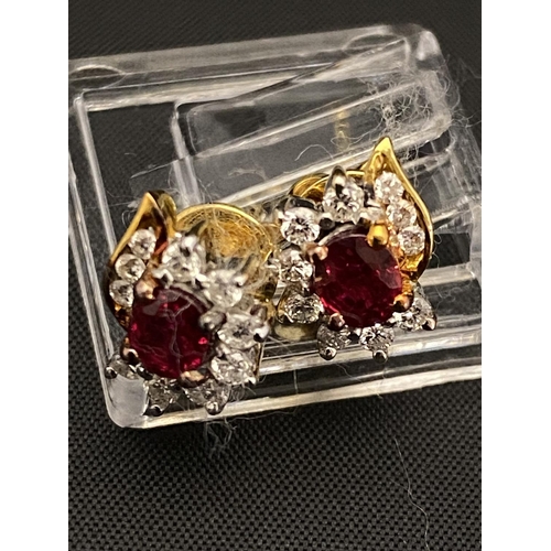 107 - A18ct gold Ruby and Diamond ring pendant and earring set (ring size K) total weight 8.88g