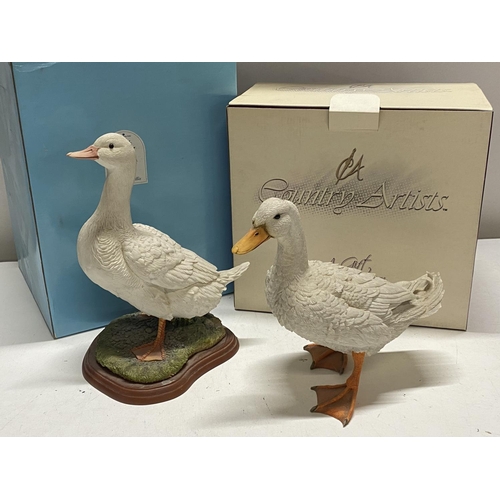 132 - A boxed Country Artists duck figurine and a Border Fine Arts figurine by Russell Willis