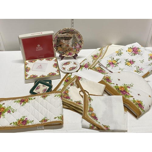 17 - A large selection of Royal Albert Old Country Roses accessories including tablecloths, placemats, et... 