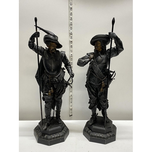 24 - A pair of large quality spelter figurines in the form of Spanish conquistador's h62cm, shipping unav... 