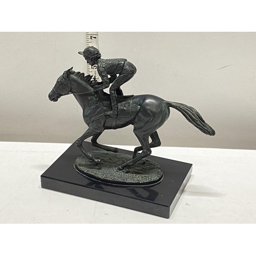 28 - A heavy commemorative horse racing bronze entitled 'Champion Finish' depicting Lester Piggott riding... 