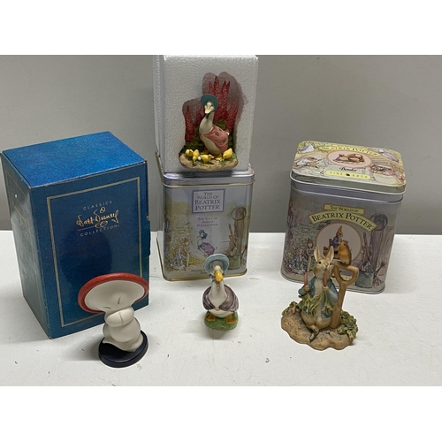 37 - A selection of boxed assorted Beatrix Potter and Disney figurines by assorted makers including Beswi... 