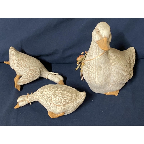 42 - Three ceramic duck figurines, shipping unavailable