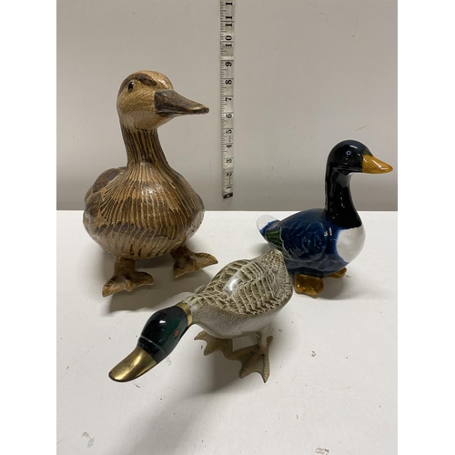 44 - Three assorted ceramic duck figurines, shipping unavailable