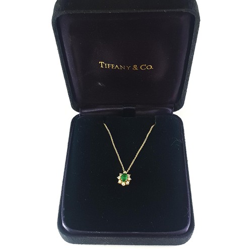 110 - A boxed 18ct gold Emerald and Diamond chain and pendant by Tiffany and Co