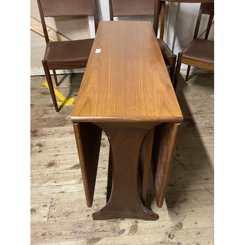 64 - A vintage mid century G plan teak dining table and four chairs (table 92x31cm when closed), shipping... 