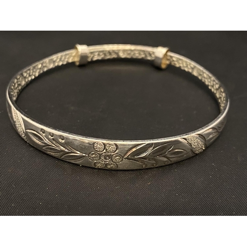 337 - A 925 silver bangle