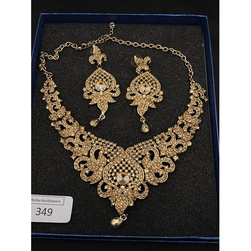 349 - A statement piece necklace and earring set