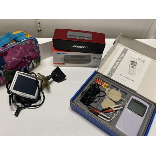 137 - A selection of assorted electronics including Bose speaker and Sat Nav (untested)