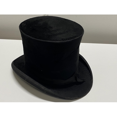 145 - A antique mole skin top hat by Christies of London