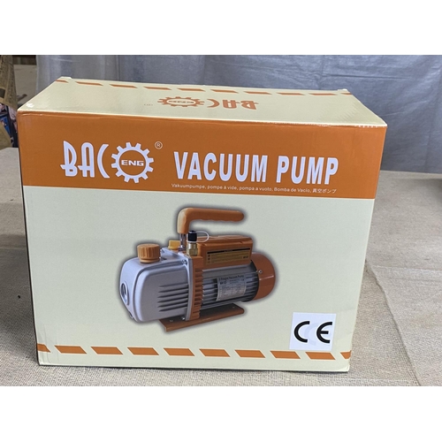 196 - A new boxed vacuum pump (unchecked)