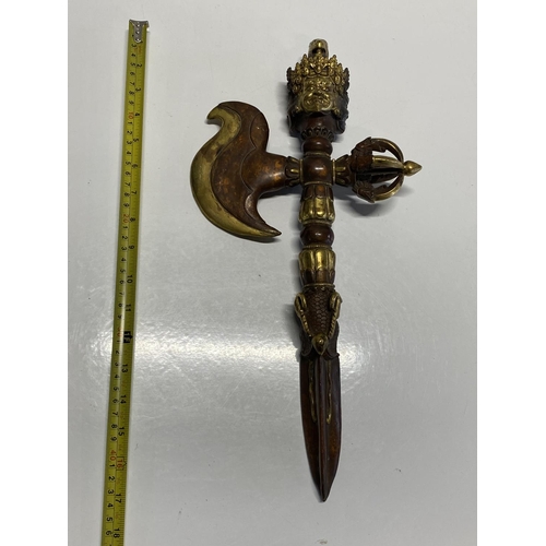 205 - A heavy antique ritual Tibetan iron and gilt bronze Vajra Kartika Phurba dagger with finely cast ima... 