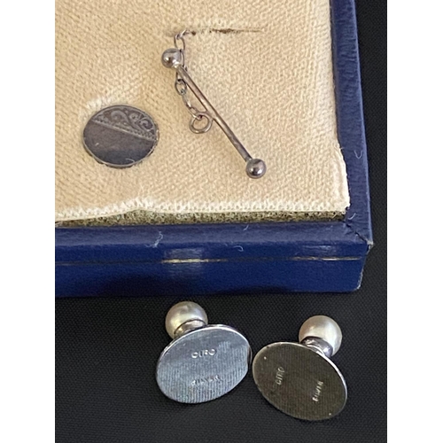 216 - A silver tie-pin and pair of silver Ciro studs