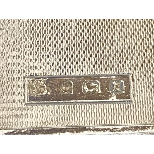 217 - A hallmarked silver cigarette case 189g