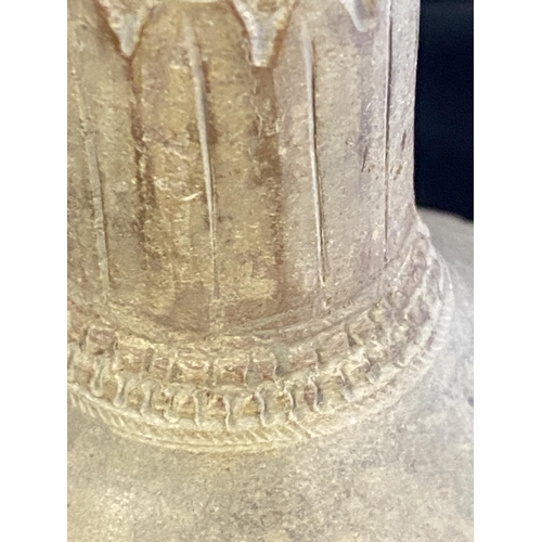 224 - A circa 12th century Abbasid Dynasty (modern day Bagdad) clay vase with hand work foliage decoration... 