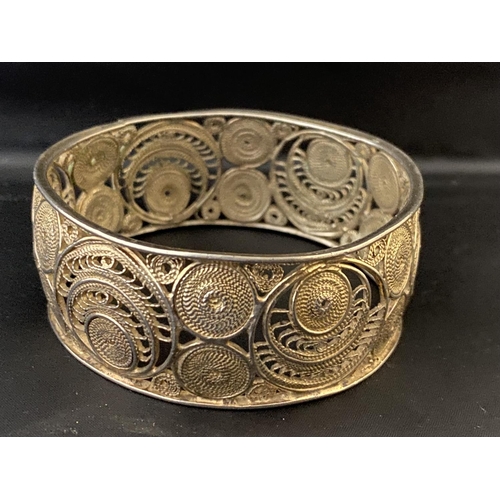 239 - A vintage white metal bracelet with yellow stones and a hallmarked filigree bangle.