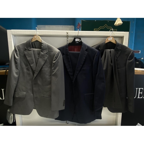 295 - Three assorted men's suits