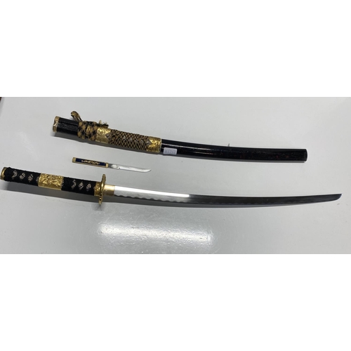 90 - A well made quality reproduction Japanese Katana sword with scabbard and matching Kozuka knife, ship... 