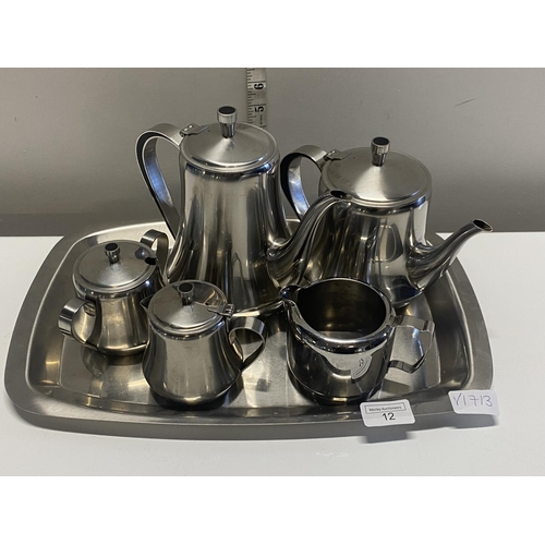 12 - A vintage 'Old Hall' stainless steel tea service. Shipping unavailable