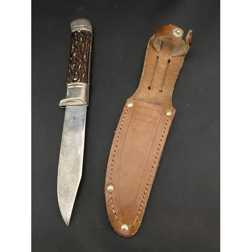 120 - A faux antler sheathed hunting knife