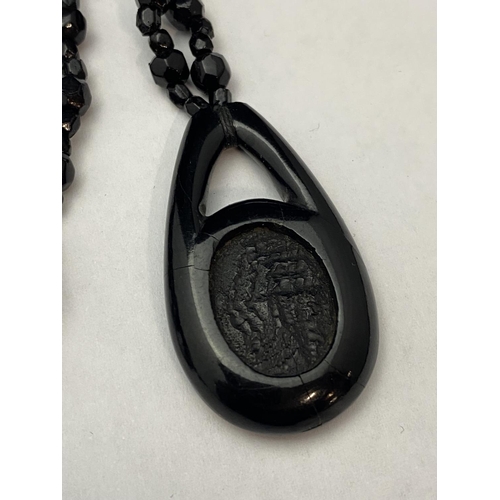 133 - A antique Victorian Whitby Jet mourning necklace & pendant