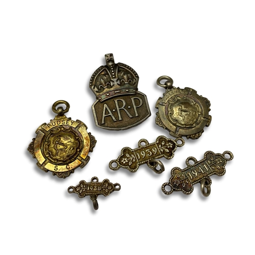 134 - A selection of hallmarked silver items including a ARP badge.