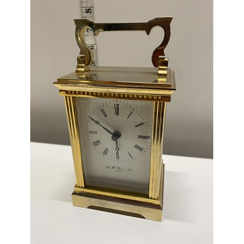 15 - A heavy brass A.M. Row & Son Ripon carriage clock (battery powered)