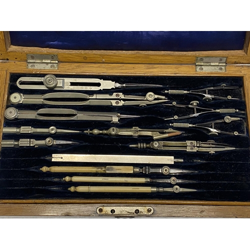 16 - An antique cased set of vintage technical drawing instruments, shipping unavailable