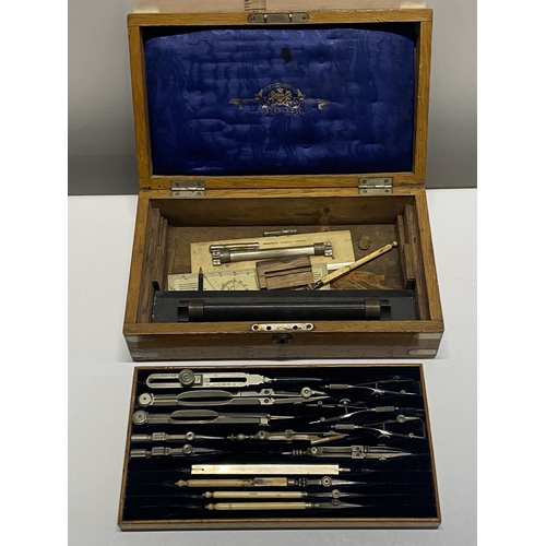 16 - An antique cased set of vintage technical drawing instruments, shipping unavailable