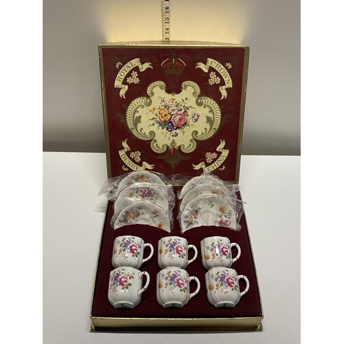 20 - A boxed Royal Crown Derby tea service 'Derby Poesies', shipping unavailable