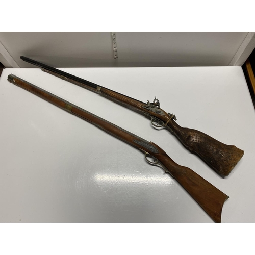 229 - Two vintage wall hanging flintlock rifles, shipping unavailable