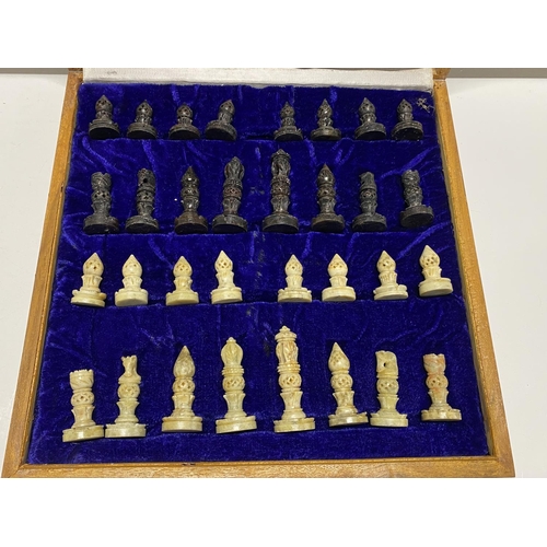 292 - A boxed chess set complete