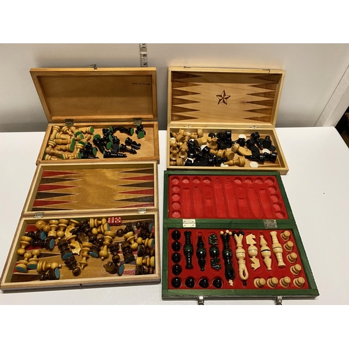 298 - Four assorted chess sets complete