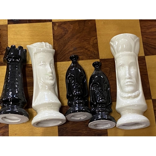 301 - A novelty ceramic chess set and board complete