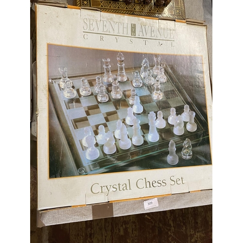 309 - Three assorted chess boards with matching pieces