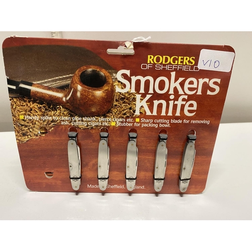 336 - A vintage Rodgers of Sheffield double sided shop display with 10 smokers knives