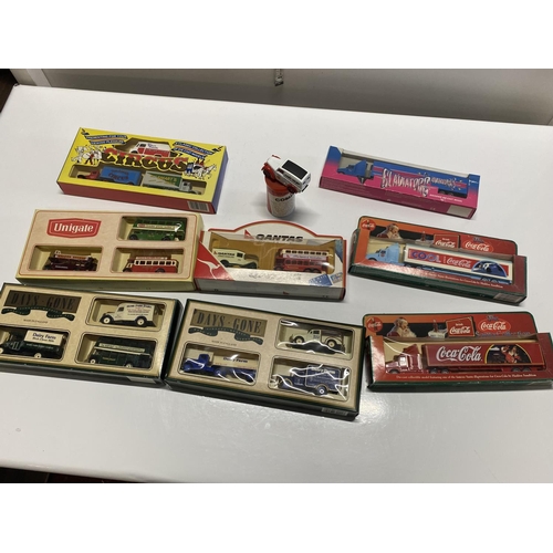 49 - A selection of assorted boxed die-cast models