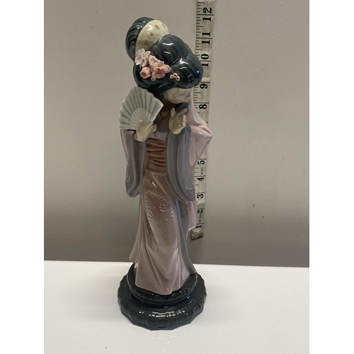 8 - A Lladro figurine of a Japanese lady h30cm. Shipping unavailable