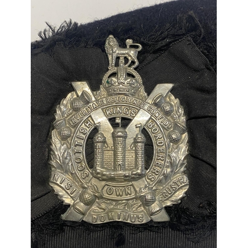 97 - A WW1 period Kings Own Borderers Glengarry with an additional Kings Own Borderers badge and a KOSB s... 