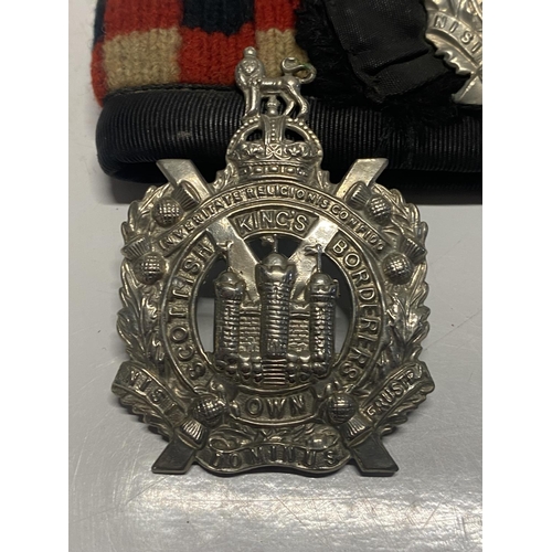 97 - A WW1 period Kings Own Borderers Glengarry with an additional Kings Own Borderers badge and a KOSB s... 