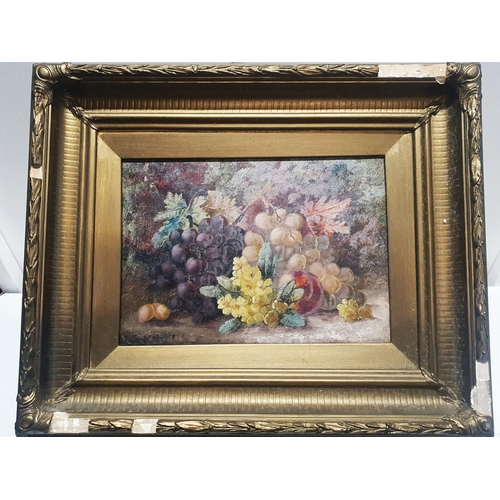 29 - A Alice Redgrave in the manner of Oliver Clare oil on canvas depicting fruit and fauna in a ornate g... 