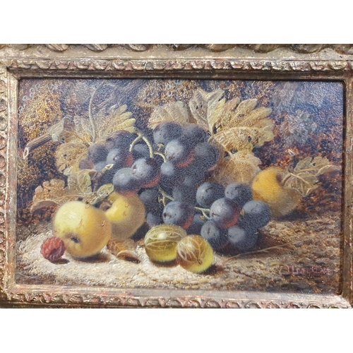 9 - A Oliver Clare (1853-1927) oil on board depicting still life study of fruit signed to lower right in... 