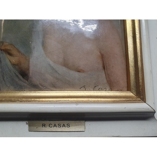 102 - A framed miniature print of a semi-nude woman singed R. Casas overall dimensions 22x18cm