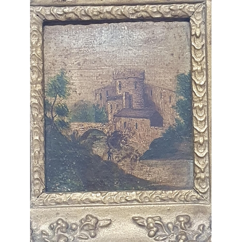 111 - A miniature landscape painting on board depicting a castle scene in a ornate gilt frame overall 18x1... 